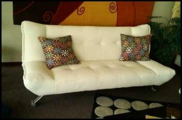 The 'Downtown' convertible sofa also folds flat for a bed.