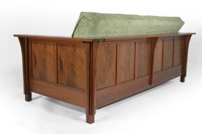 This Futon is a new style with a fully enclosed back, looks great in any room.